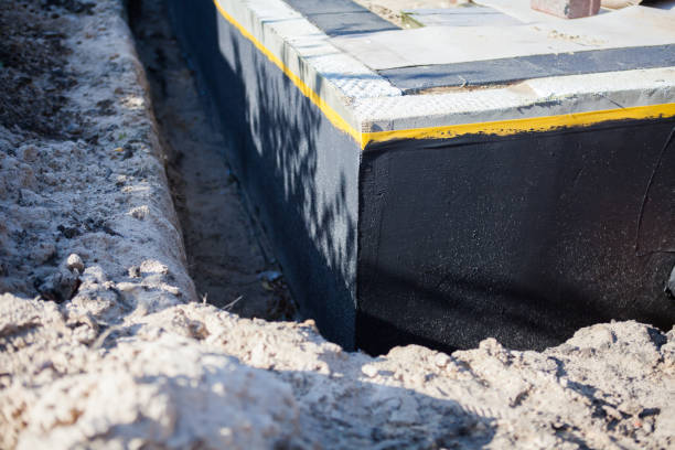 Professional Basement Waterproofing technician working in West Millgrove, OH